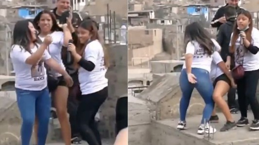 Bailan y cantan sobre las tumbas de víctimas de una tragedia en Perú
