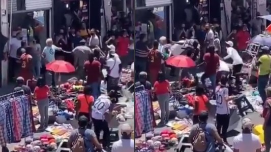 Video: batalla campal entre manteros y comerciantes en Flores