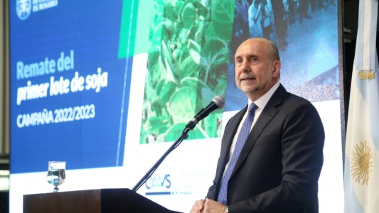 Perotti participó del remate del primer lote de soja en la bolsa de comercio de Rosario