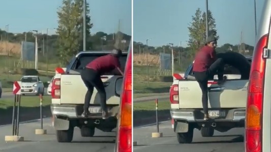 Video: se trepó a una camioneta en la ruta para robarle la rueda de auxilio